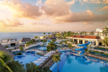 Aerial view of Nizuc section pools at Moon Palace Cancun with waterslide and family-friendly layout