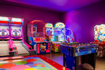 Kids Playroom at Moon Palace Cancun with arcade games and colorful indoor activity area