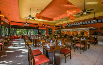 Rincón Mexicano restaurant at El Dorado
Royale Riviera Maya featuring traditional décor and indoor dining inspired by
authentic Mexican cuisine.