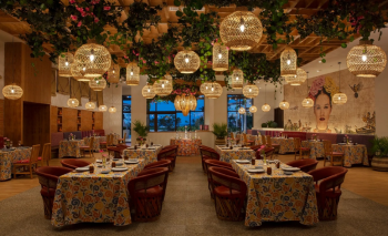 Colorful dining room at Tres Colores, the Mexican restaurant at Dreams Playa Mujeres resort Colorful dining room at Tres Colores, the Mexican restaurant at Dreams Playa Mujeres resort